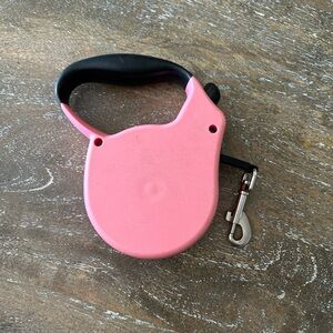 Pink and black retractable leash for dogs